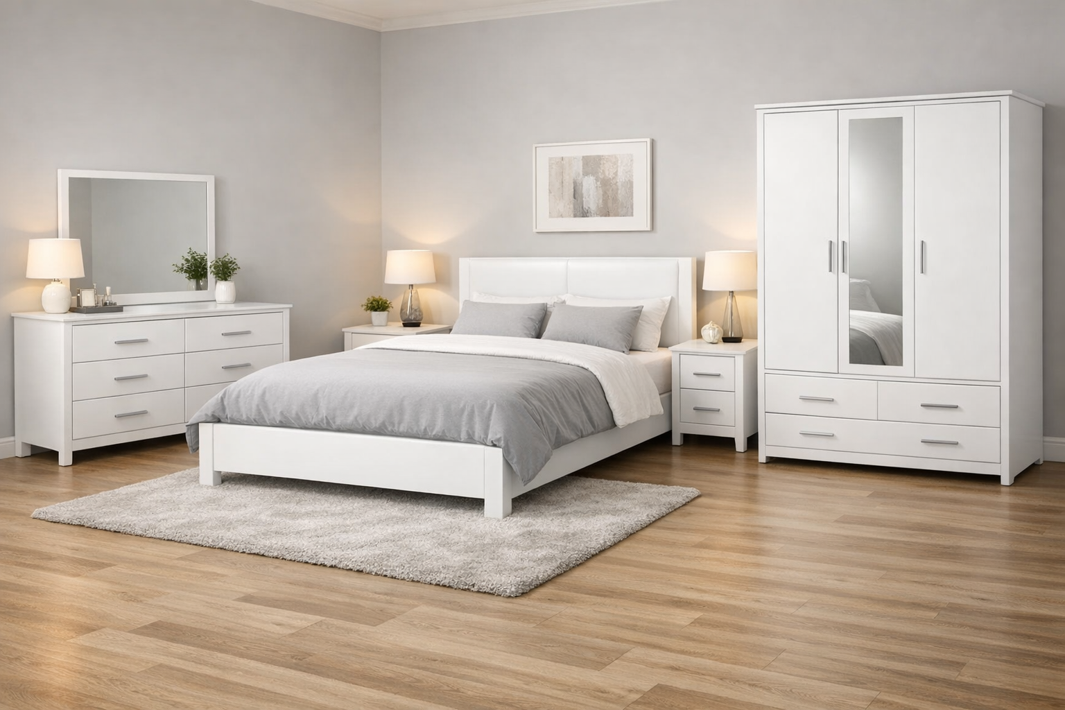 Quality bedroom sets from brands like Ikea and Nabco are highly sought after in the Doha resale market. A complete white bedroom set including a bed frame and side tables, representative of high-value used furniture in Qatar.