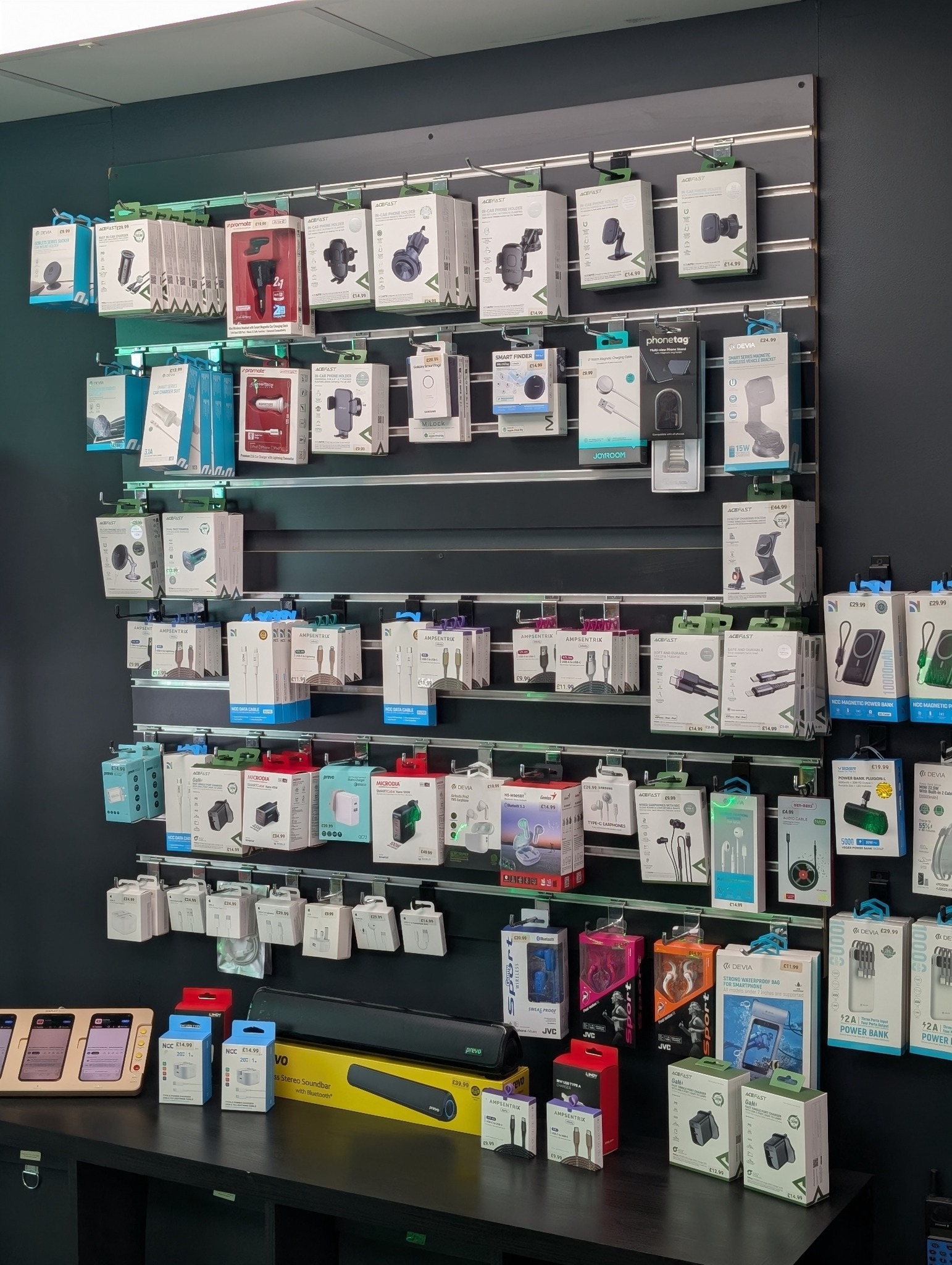 Phone chargers, cables and accessories on display inside NXT GEN